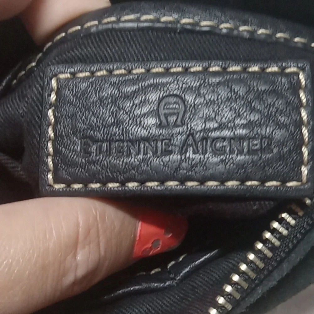 Etienne Aigner black leather wristlet